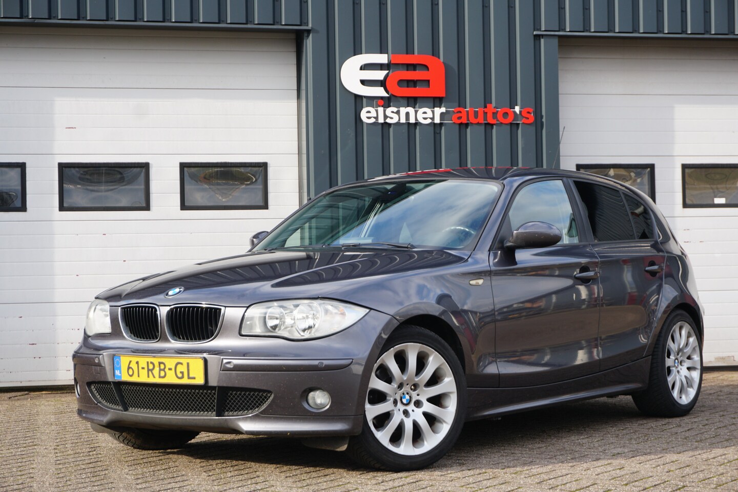 BMW 1-serie - 120i High Executive | AUTOMAAT | NAVI | ECC| - AutoWereld.nl