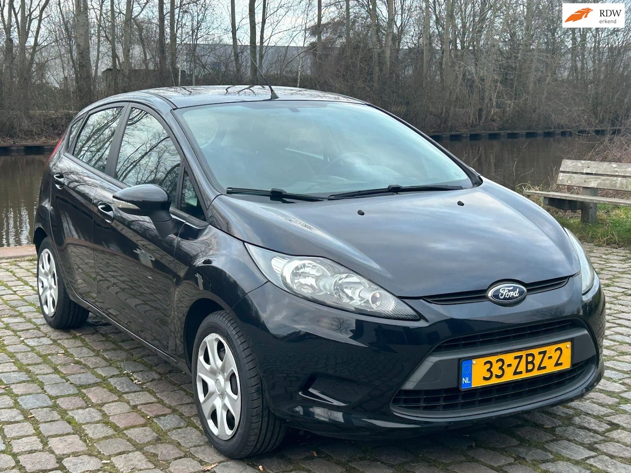 Ford Fiesta - 1.25 Champion 2e eigenaar dealer onderhouden airco cv op afs elektrische ramen - AutoWereld.nl