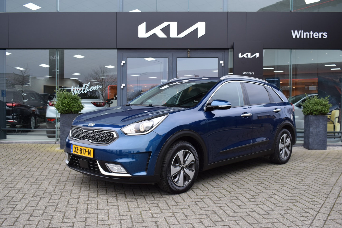 Kia Niro - 1.6i-16V Hybrid DynamicPlusLine DCT6-Autom. ECC Cr.Control-Adapt. Navi+Camera BT+USB Leder - AutoWereld.nl