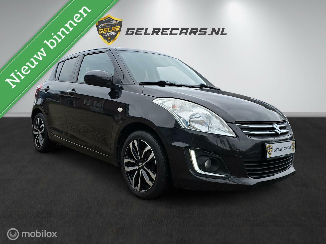 Suzuki Swift - 1.2 X-TRA Airco Cruise Stoelvw - AutoWereld.nl