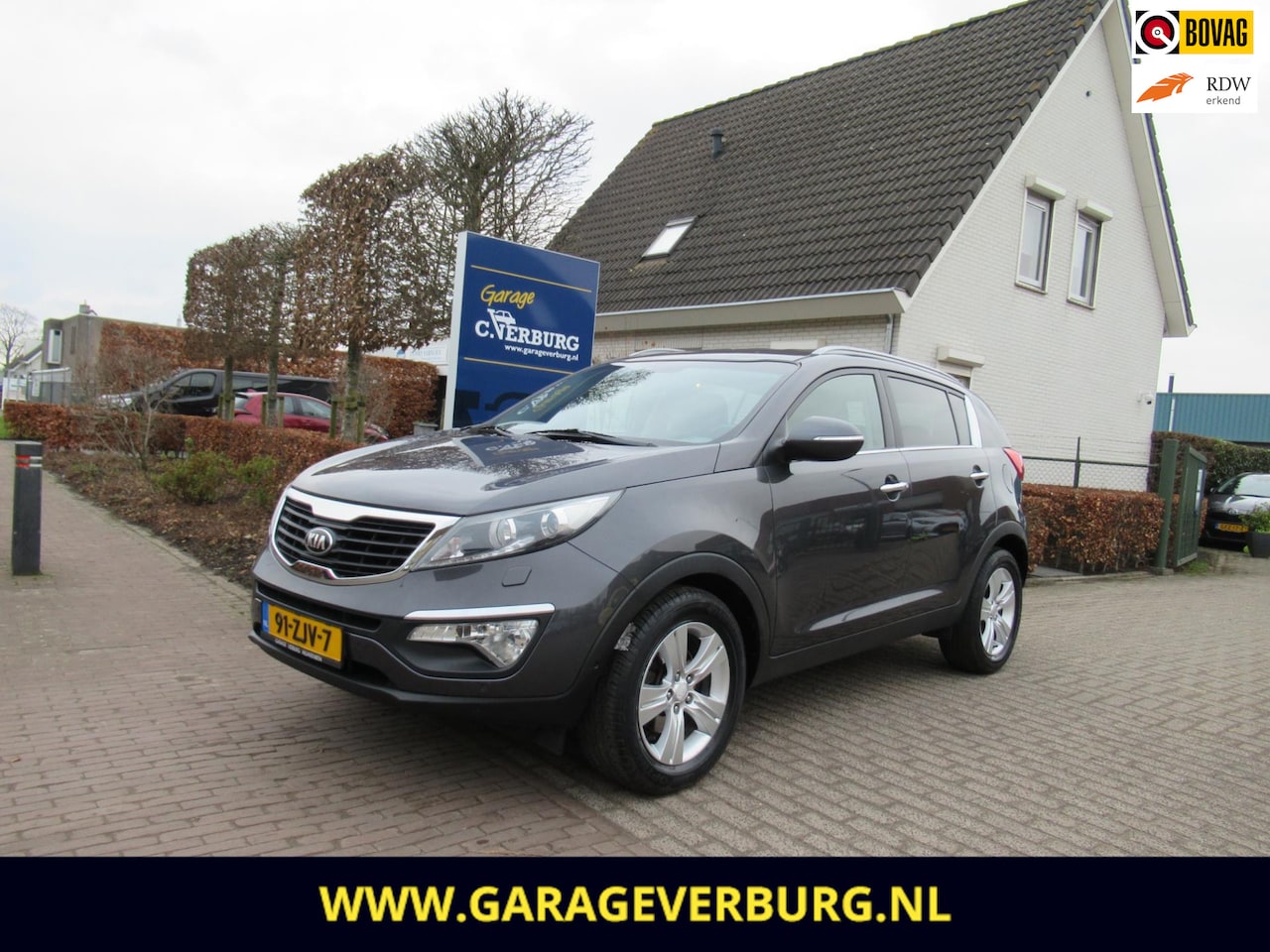 Kia Sportage - 1.6 GDI Super Pack (1e eigenaar,Navi,Camera,Cruise,Leer,Stoelverwarming,Trekhaak,Xenon) - AutoWereld.nl