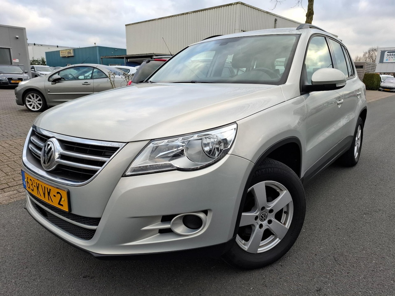 Volkswagen Tiguan - 1.4 TSI Comfort&Design CLIMA/CRUISE/TREKHAAK! - AutoWereld.nl