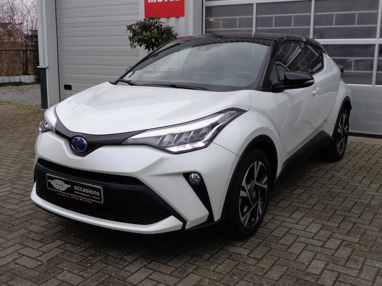 Toyota C-HR - 2.0 Hybrid Executive Navi,DAB,Two Tone,Half leder,etc,etc - AutoWereld.nl