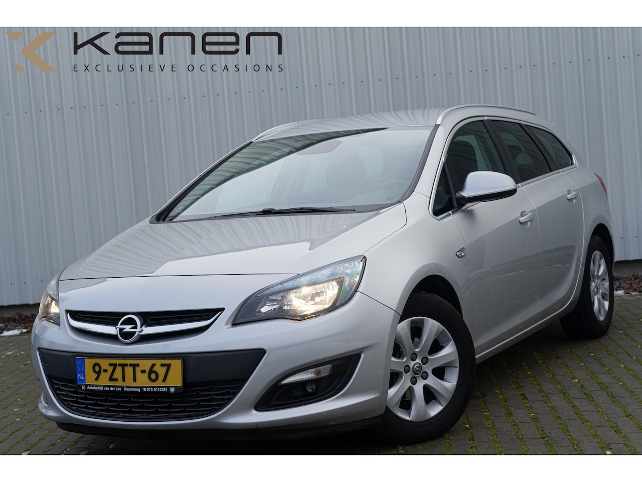 Opel Astra Sports Tourer - 1.4 Turbo Edition Cruise Control Navi PDC Bluetooth Klima Trekhaak H6 - AutoWereld.nl