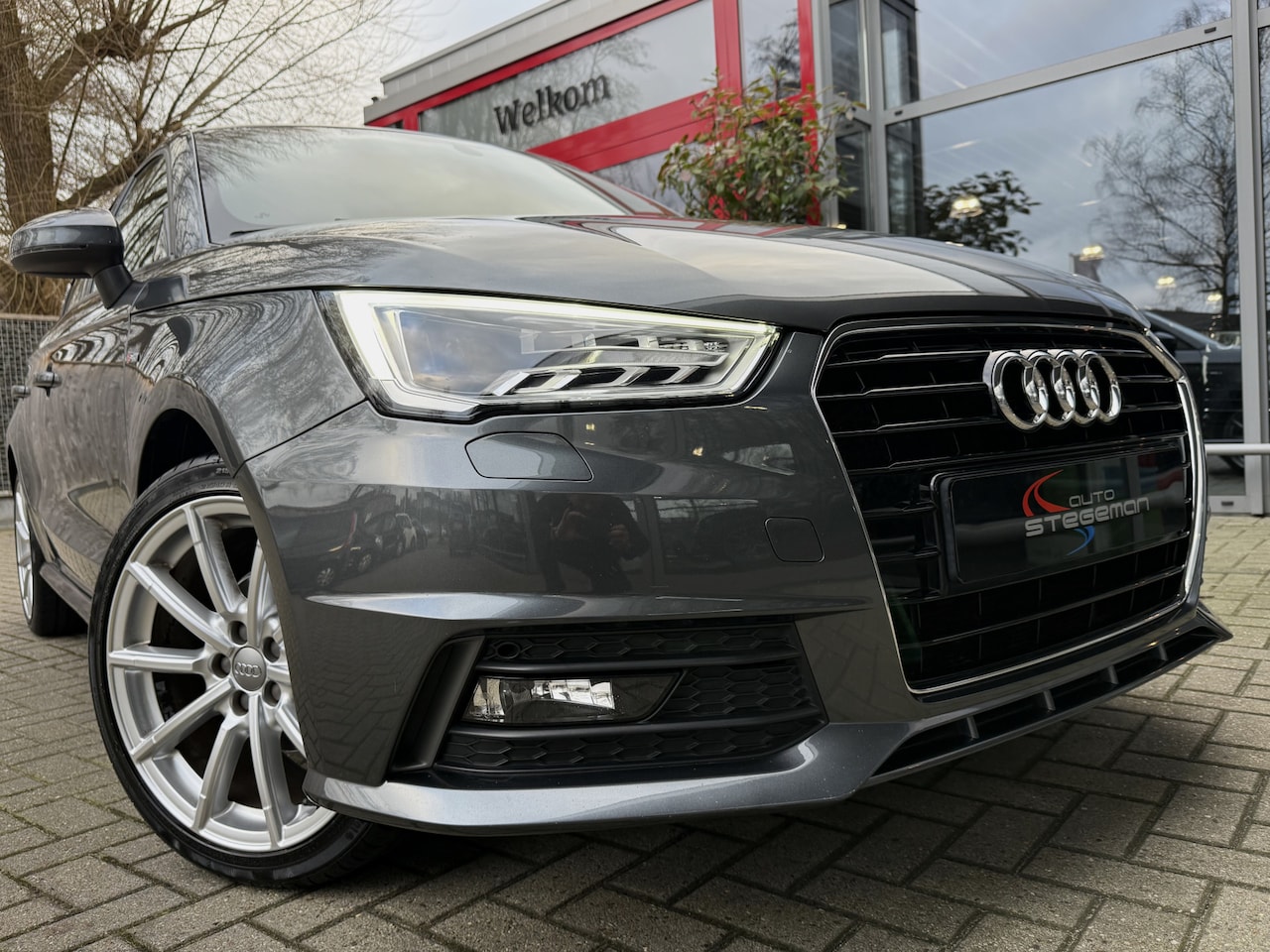 Audi A1 Sportback - 1.0 TFSI *!* 2x S-LINE *!* NAVIGATIE/ BI-XENON/ CRUISE/ 17 INCH *!* - AutoWereld.nl