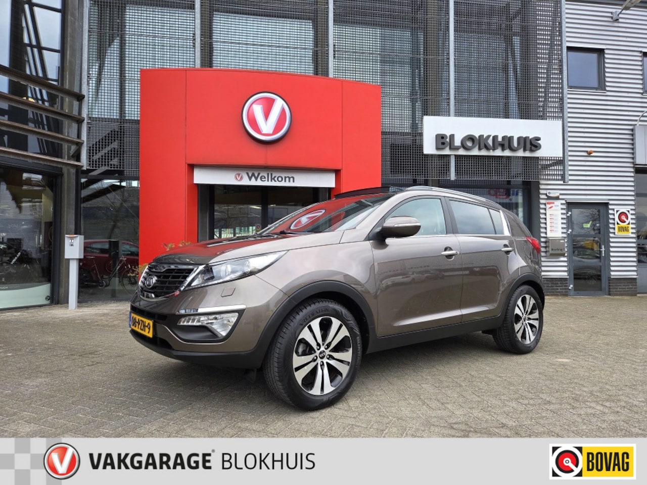 Kia Sportage - 2.0 SuperPack | Navi | Leer | stoel verw. | Trekhaak | - AutoWereld.nl