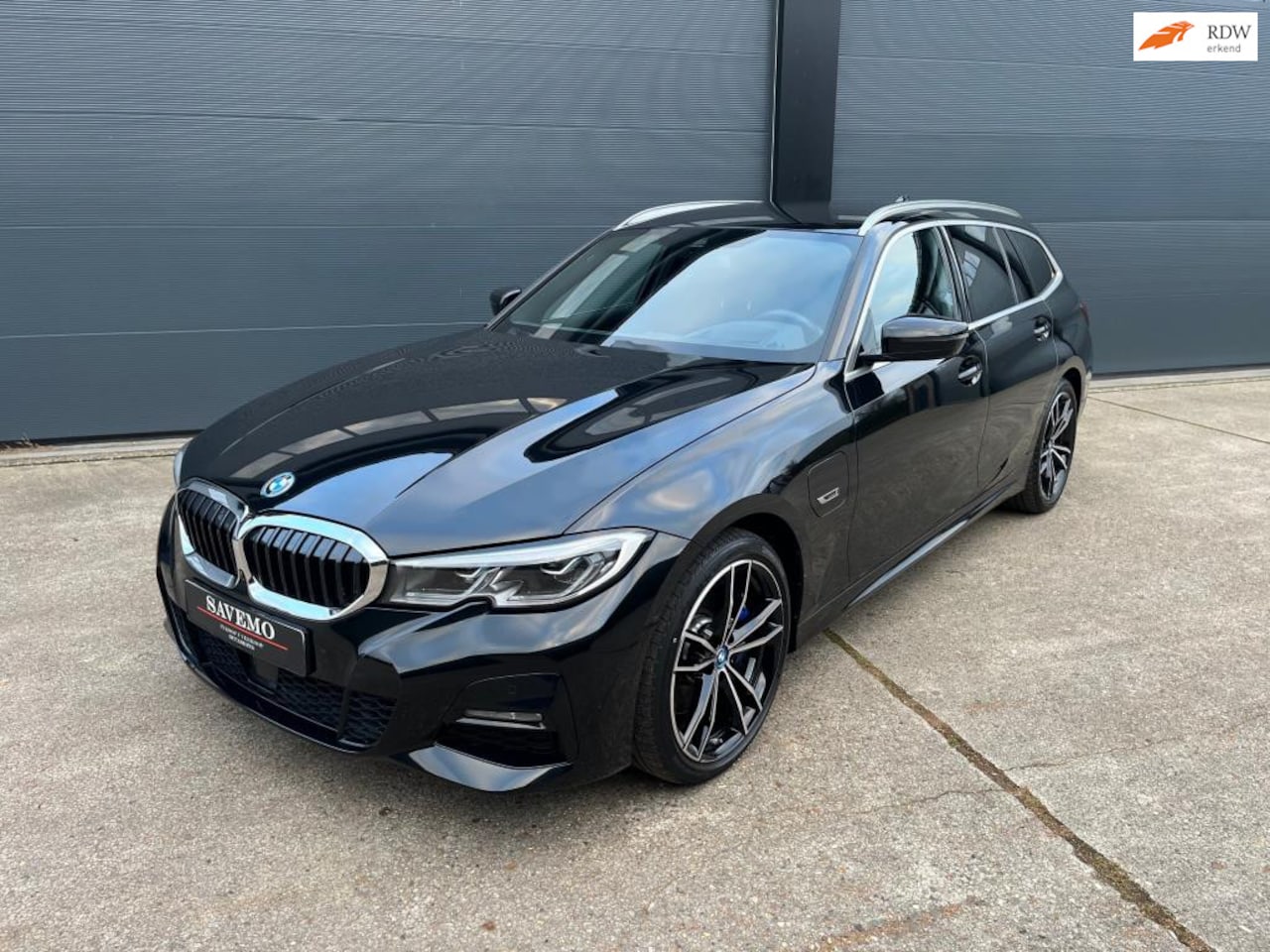 BMW 3-serie Touring - 330e High Executive M pakket / Head-up / Stuurverwarming / 360 camera - AutoWereld.nl