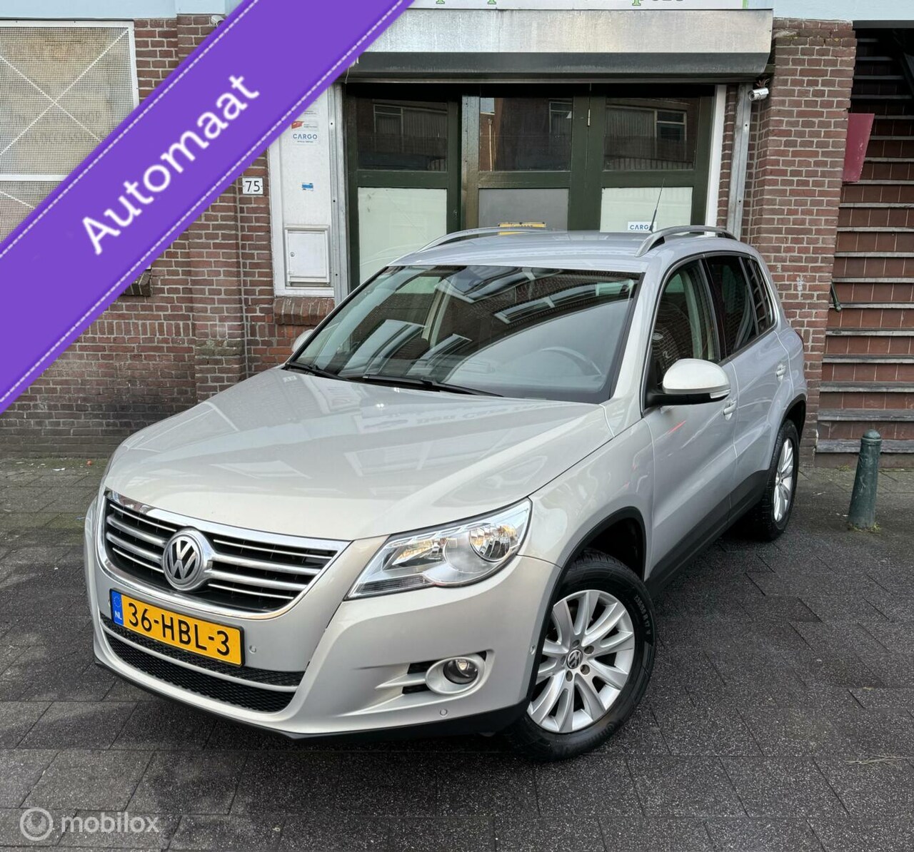 Volkswagen Tiguan - 2.0 TSI Sport&Style 4Motion - AutoWereld.nl