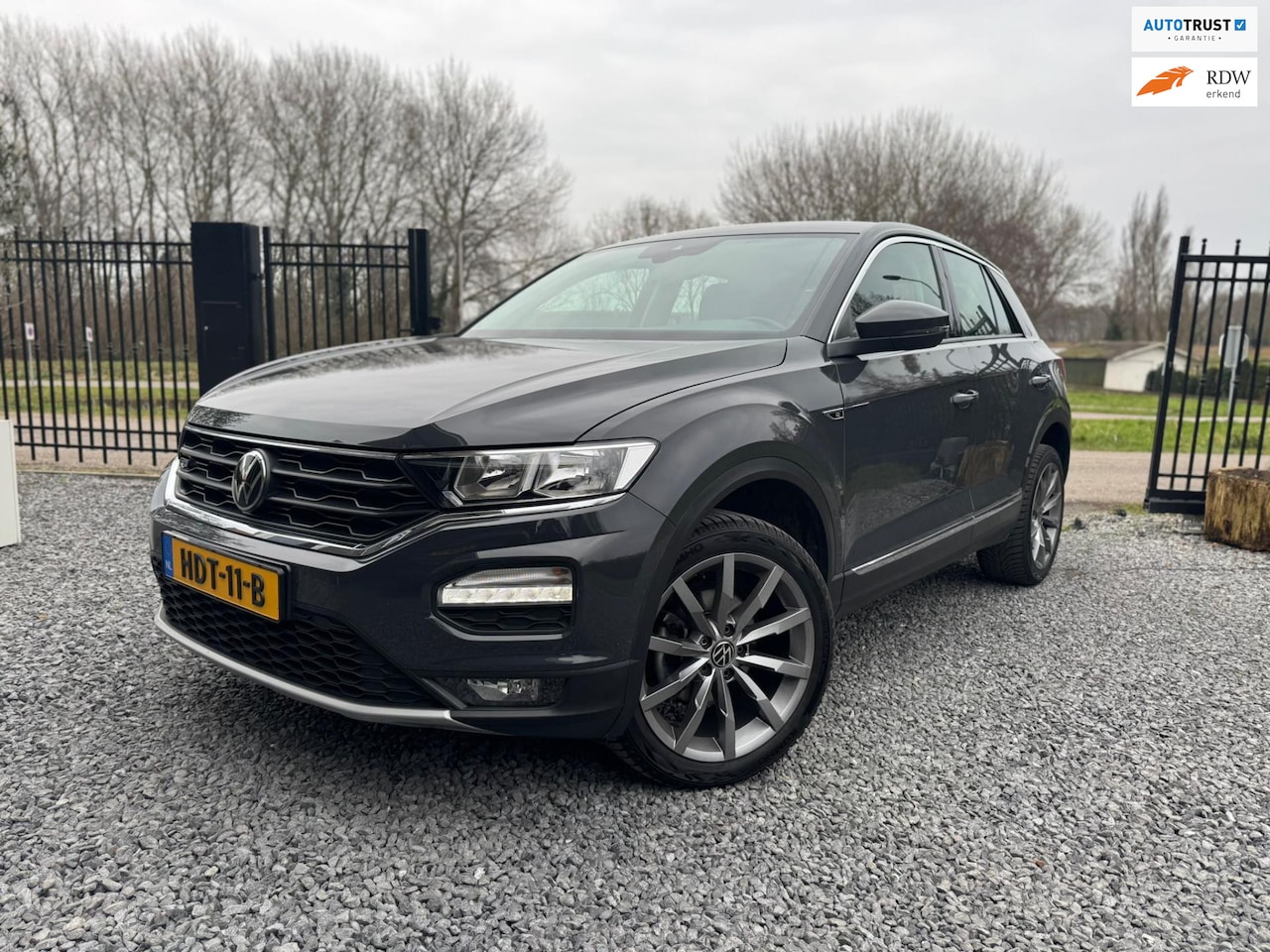 Volkswagen T-Roc - 1.5 TSI Style / DSG / Camera / Afneembare trekhaak / Stoelverwarming - AutoWereld.nl