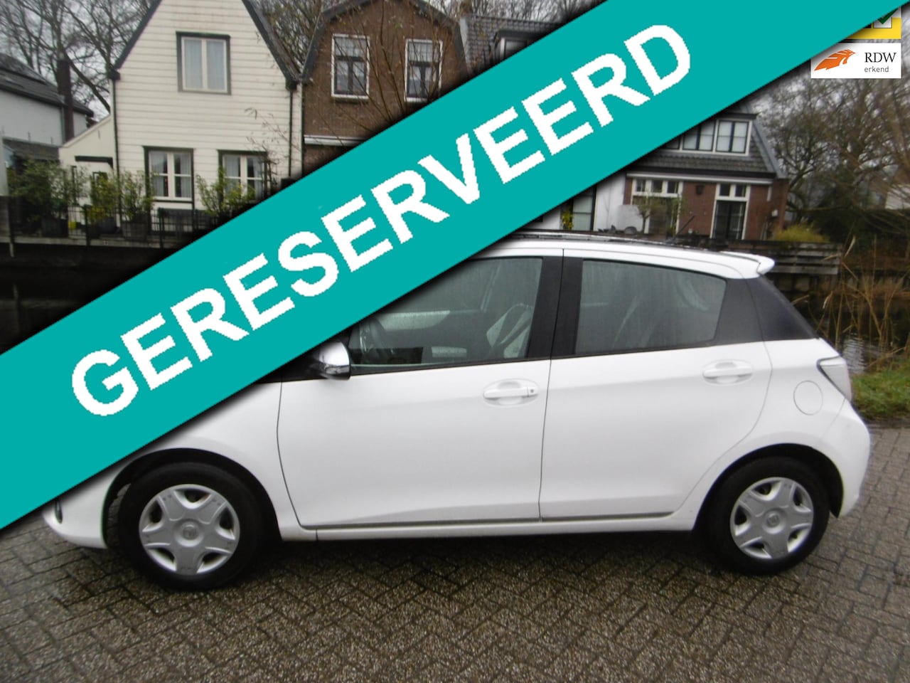 Toyota Yaris - 1.0 VVT-i Trend 5-deurs 1e eig. Clima Navi Multimedia Zuinig - AutoWereld.nl