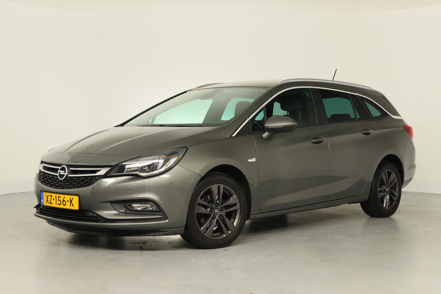 Opel Astra Sports Tourer - 1.0 Turbo 120 Jaar Edition | Navigatie | Clima | Cruise Control | Parkeersensoren V+A | Li - AutoWereld.nl