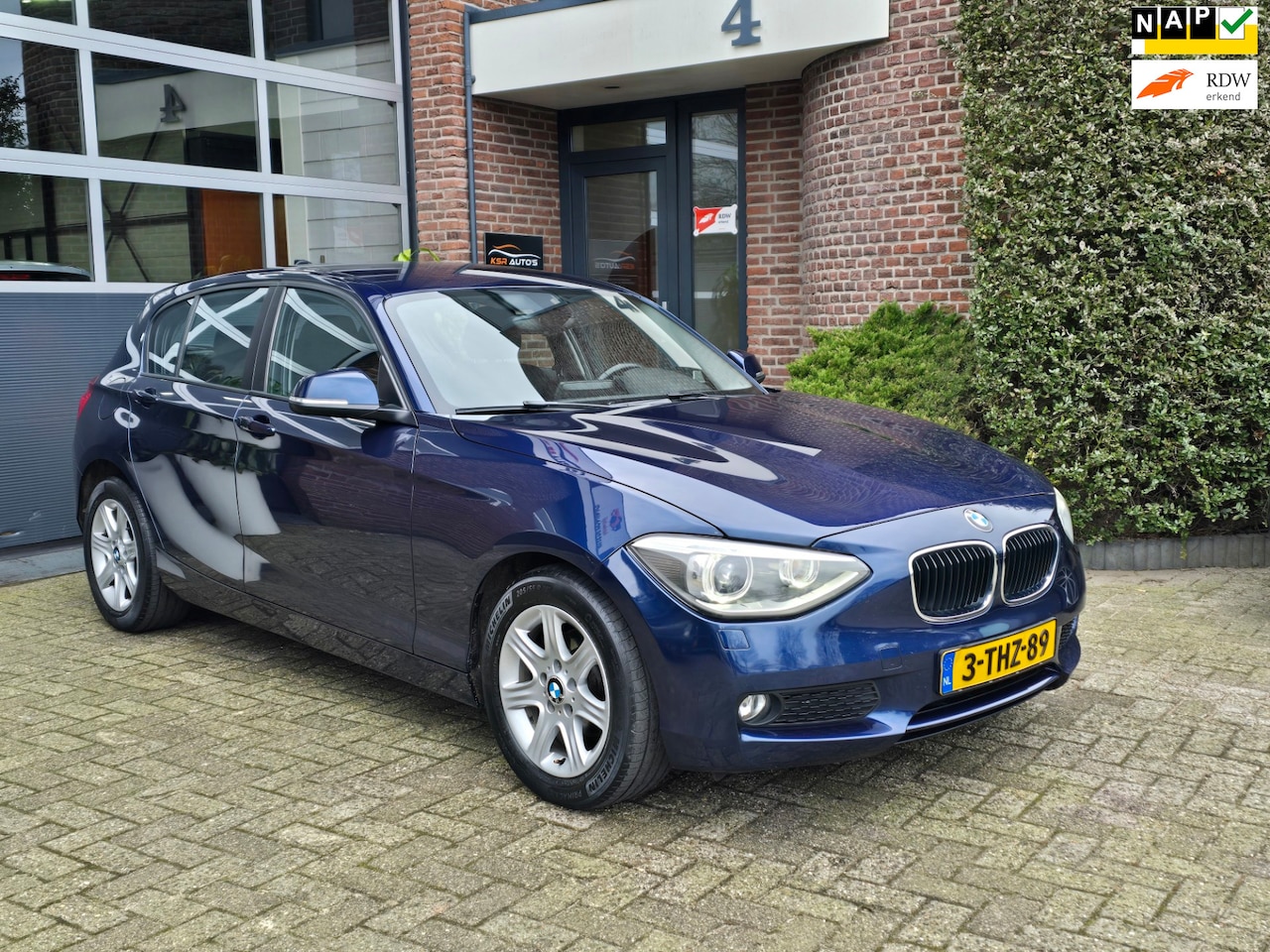 BMW 1-serie - 116i Executive Automaat |Nap |Keyless |Clima - AutoWereld.nl