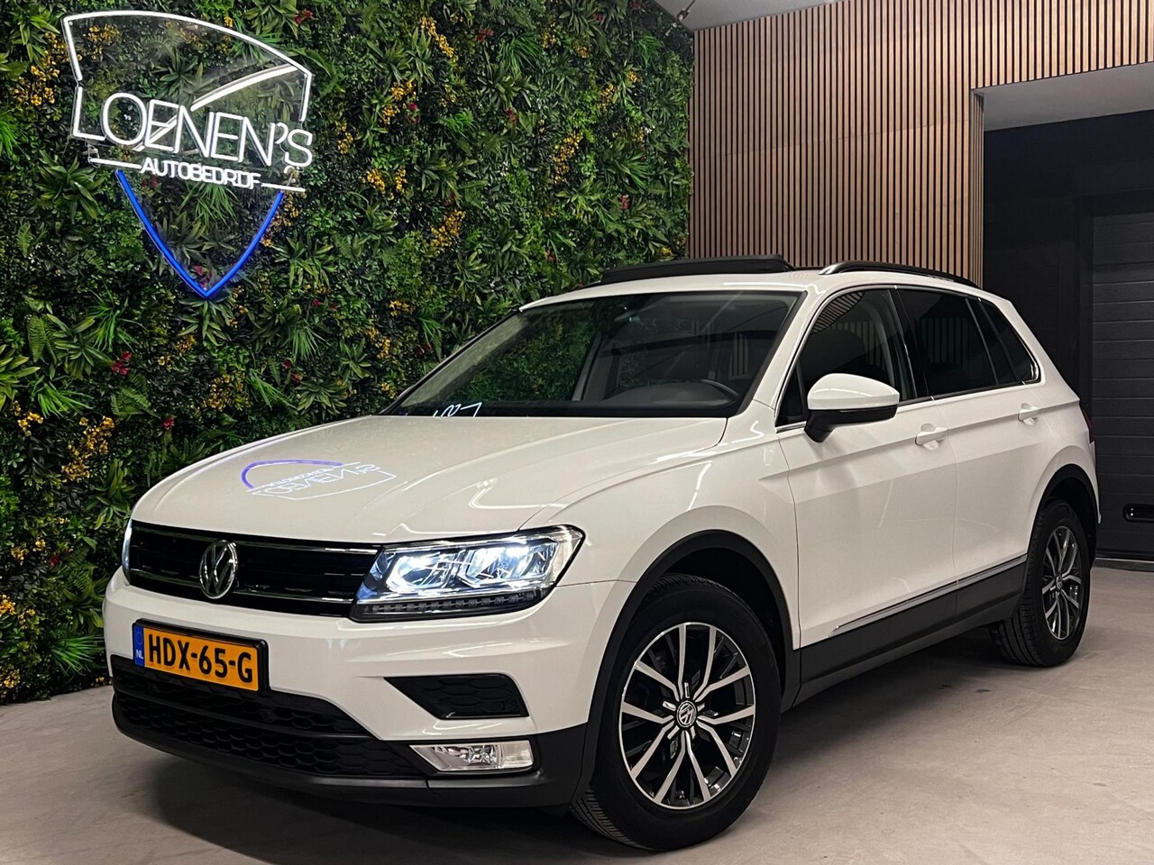 Volkswagen Tiguan - 1.4 TSI Comfortline / DSG / Pano / LED / Navi / PDC - AutoWereld.nl