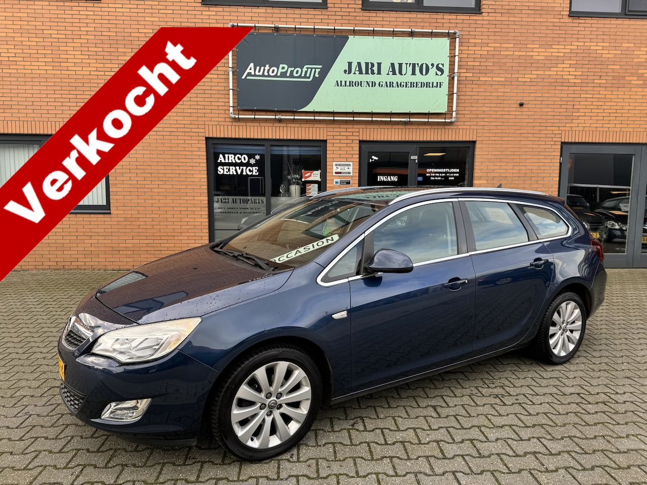 Opel Astra Sports Tourer - 1.4 Turbo Cosmo Clima, halfleer - AutoWereld.nl