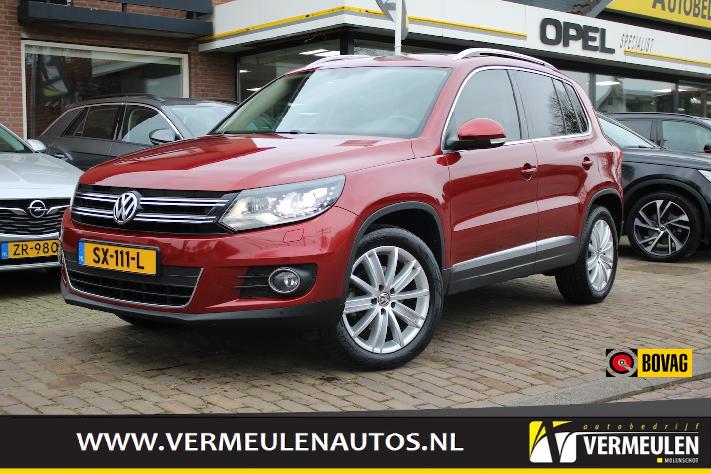 Volkswagen Tiguan - 2.0 TSI 210PK DSG Automaat Sport & Style + 18"/ Navi/ Clima/ Cruise/ Panorama/ Trekhaak - AutoWereld.nl