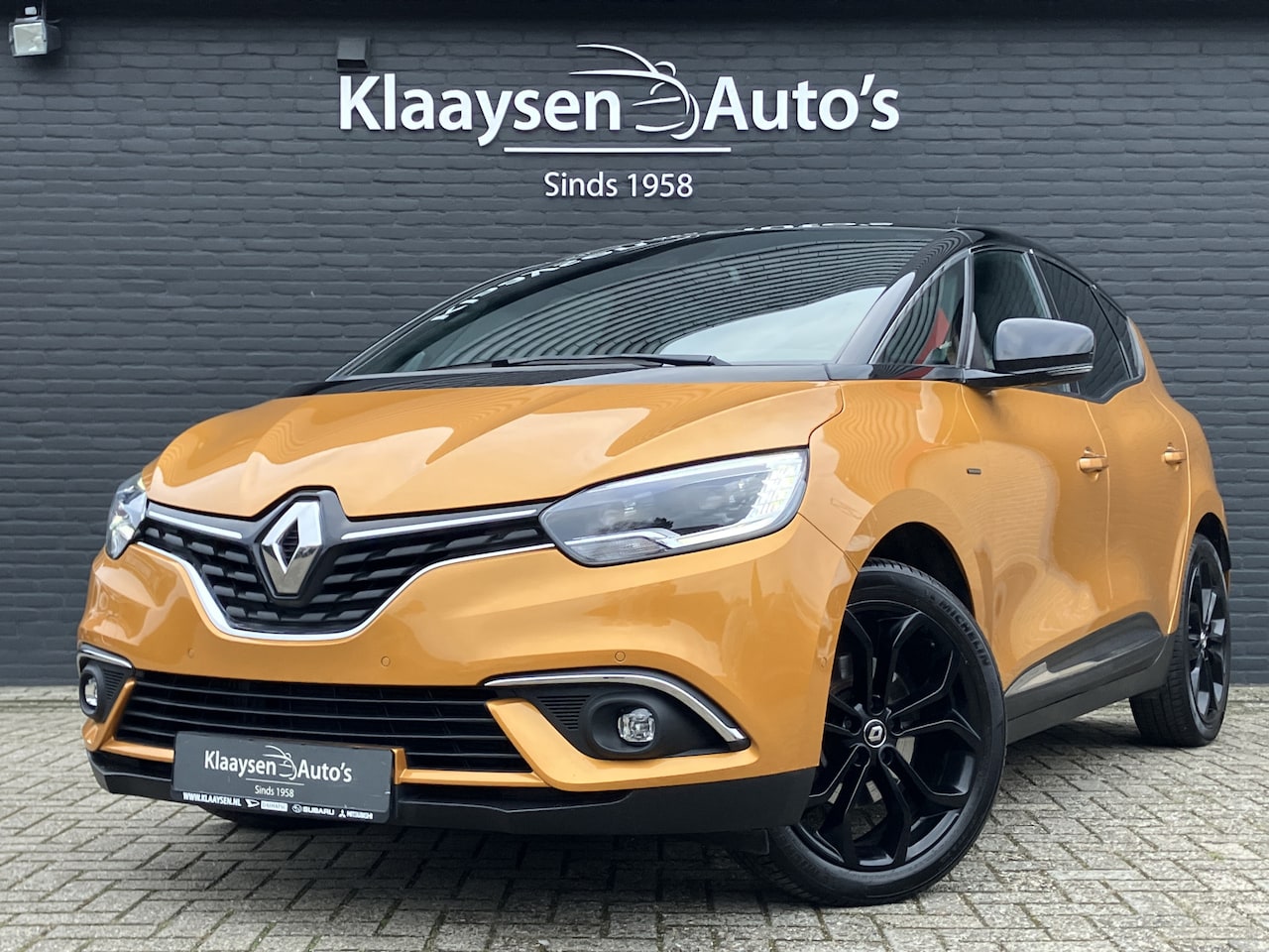 Renault Scénic - 1.3 TCe 160 pk Black Edition AUT. | 1e eigenaar | navigatie | panoramadak | trekhaak | bos - AutoWereld.nl