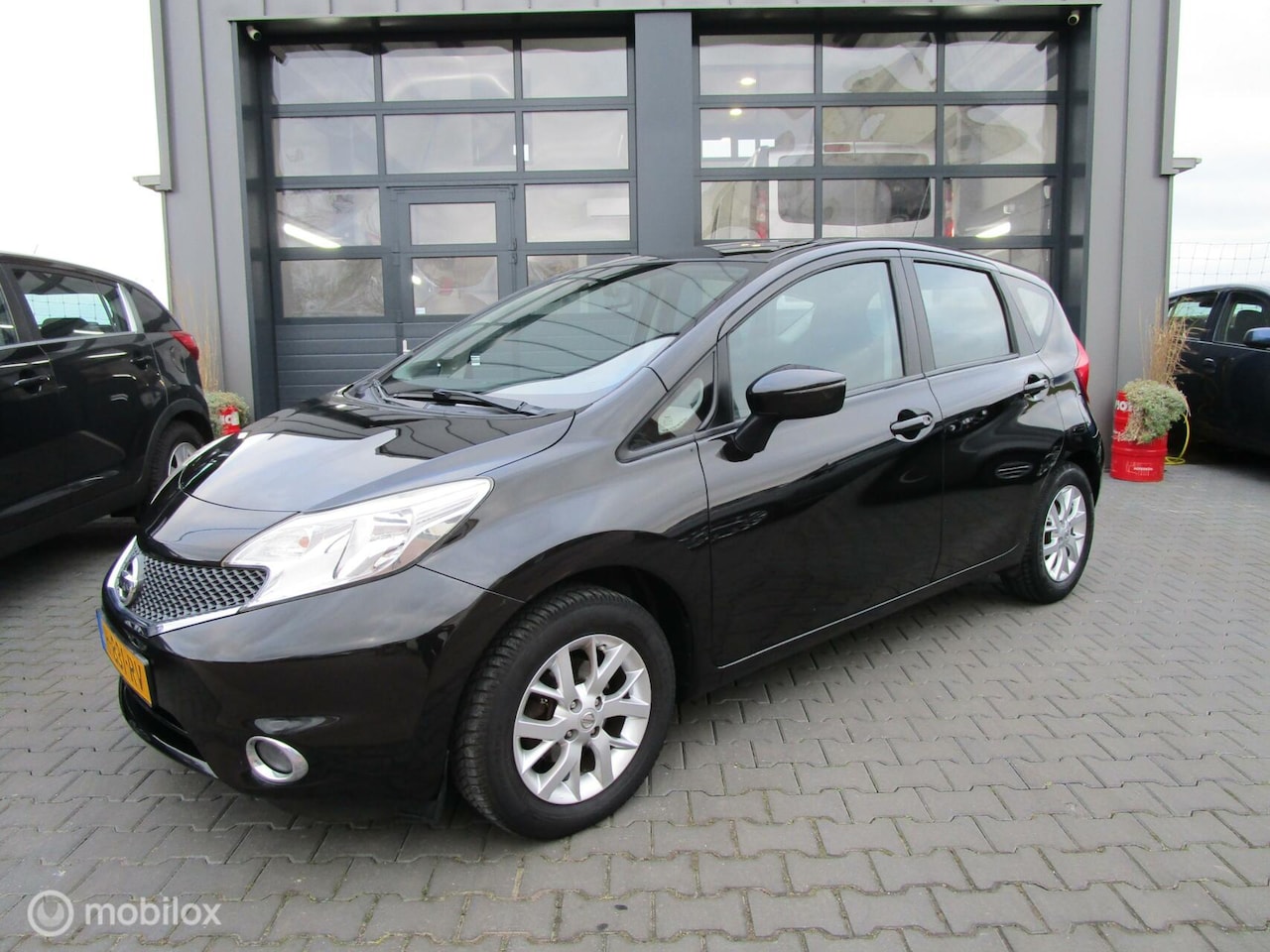 Nissan Note - 1.2 Acenta 112dkm Airco Cruise Hoge instap - AutoWereld.nl