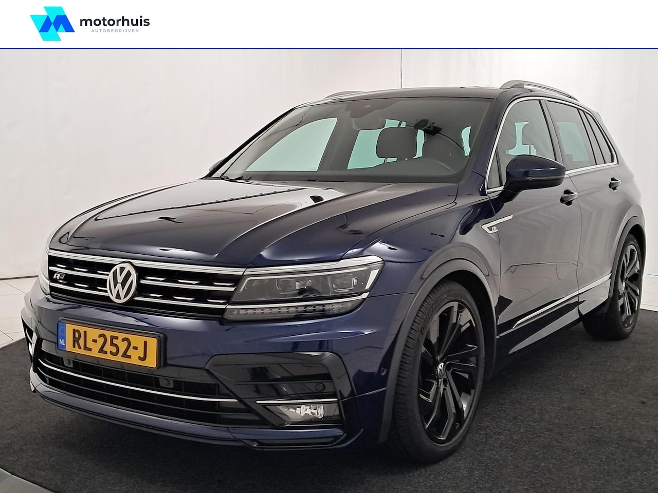 Volkswagen Tiguan - 1.4 TSI 150PK 2X R-LINE PANO VIRTUAL TREKHAAK FULL LED NAP CAMERA - AutoWereld.nl