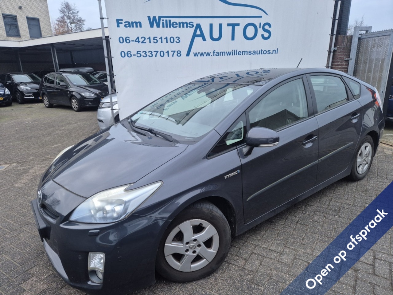 Toyota Prius - 1.8 Solar roof Navi Camera HuD - AutoWereld.nl