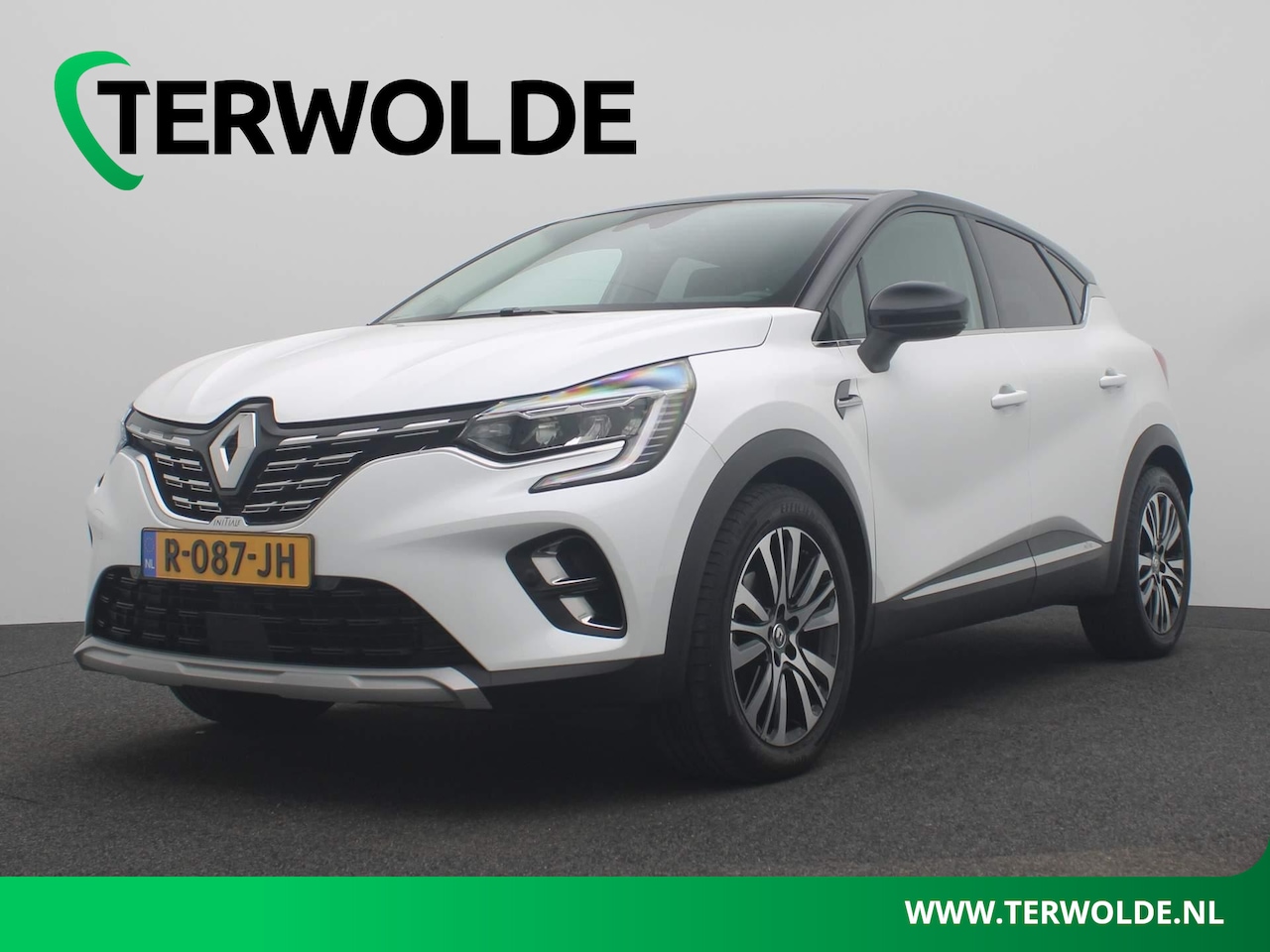 Renault Captur - 1.6 E-Tech Hybrid 145 Initiale Paris | Lederen Bekl. | BOSE audio | - AutoWereld.nl