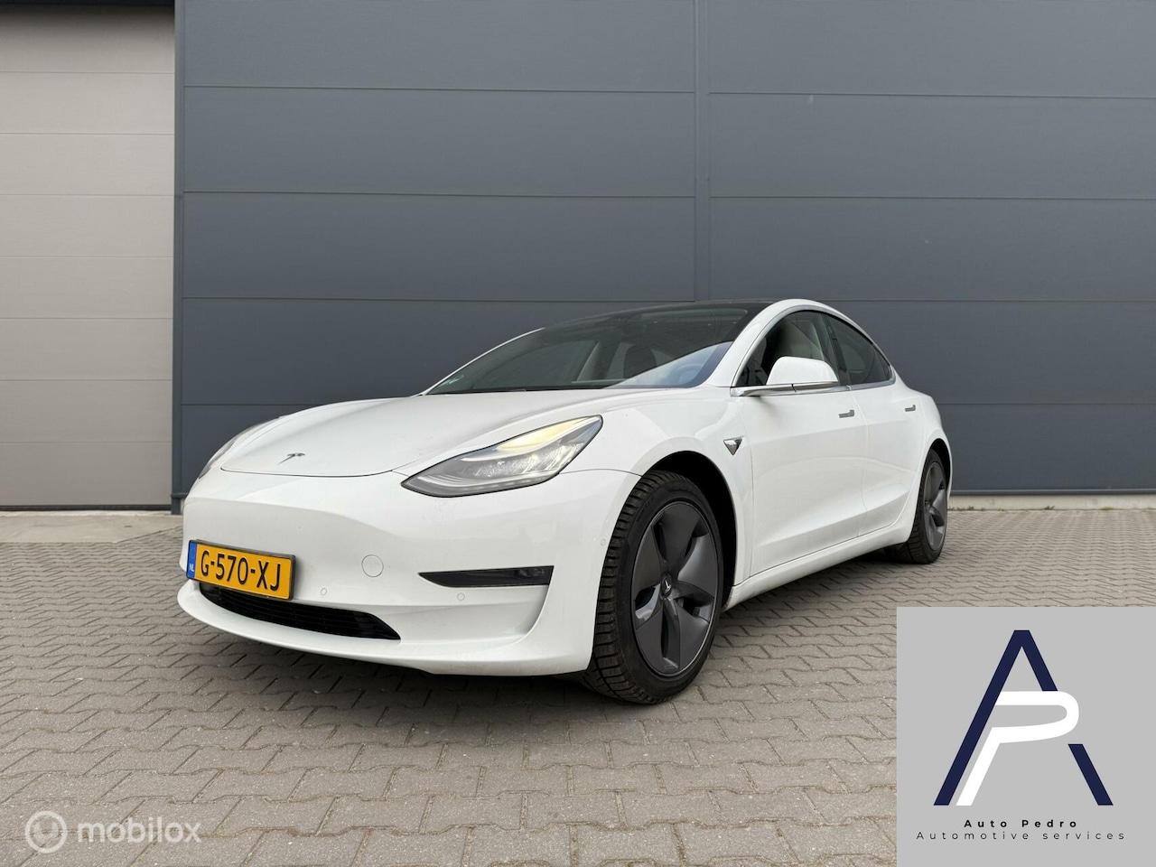 Tesla Model 3 - Long Range RWD Long Range AWD 75 kWh TREKHAAK Pearl White Autopilot BTW - AutoWereld.nl