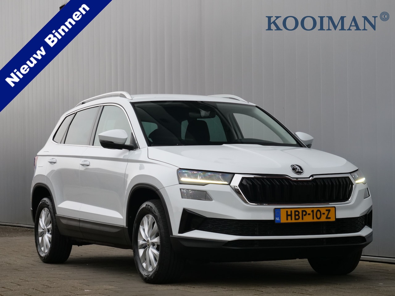 Skoda Karoq - 1.5 TSI ACT 150pk Business Edition Automaat Adaptieve Cruise / Apple Carplay / Camera - AutoWereld.nl