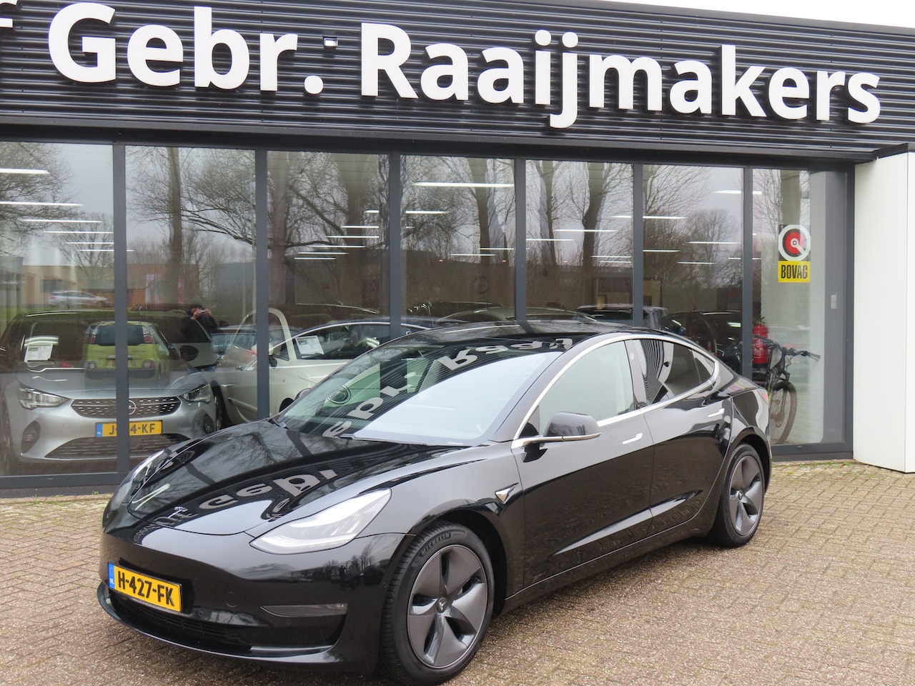 Tesla Model 3 - Long Range RWD Long Range AWD 75 kWh*Autopilot*Trekhaak*Premium Audio* EXPORT* - AutoWereld.nl