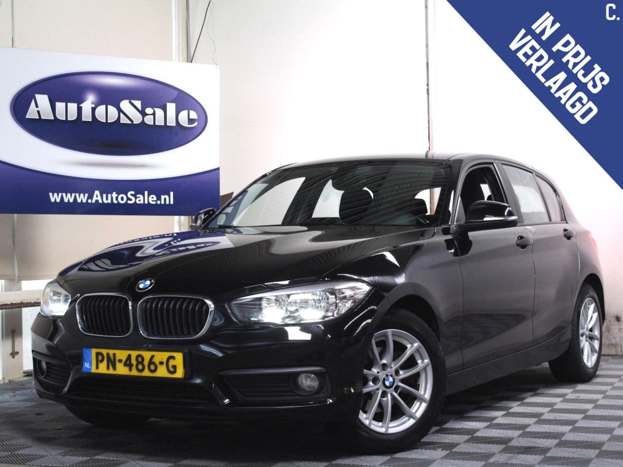 BMW 1-serie - 116i Executive M-Sport NAV BT STOELVW CRUISE PDC '16 - AutoWereld.nl