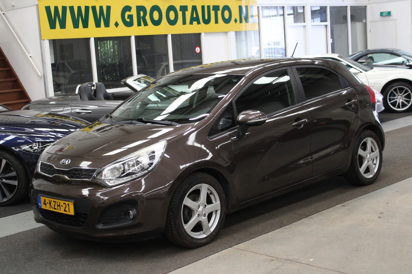 Kia Rio - 1.2 CVVT Super Pack Airco, Cruise control, Navi, Stuurbekrachtiging - AutoWereld.nl