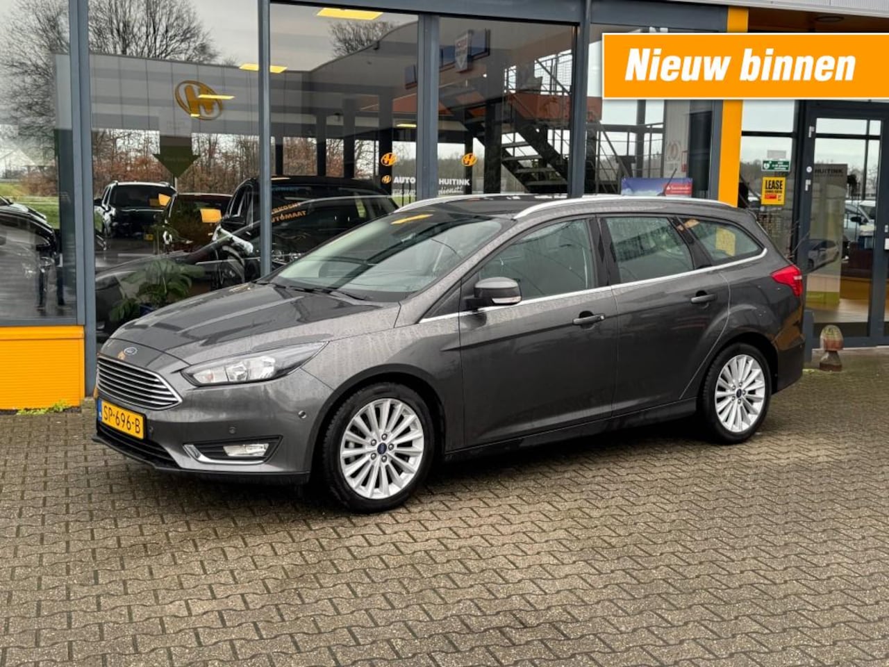 Ford Focus - 1.5 TDCI Titanium - 1e eigenaar - pdc - navi - apple/android aut - AutoWereld.nl