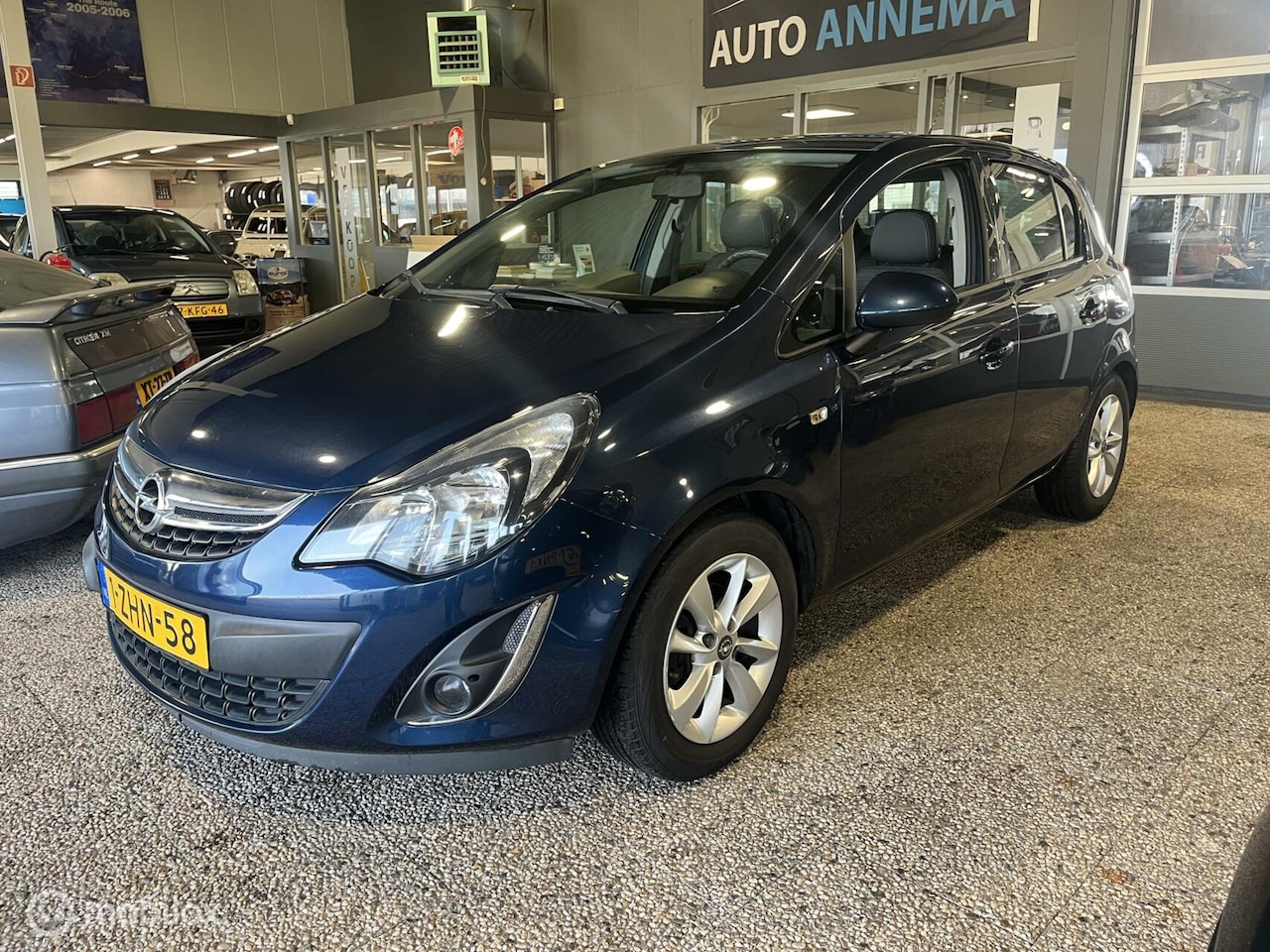 Opel Corsa - 1.2-16V Design Edition cruise airco trekhaak - AutoWereld.nl