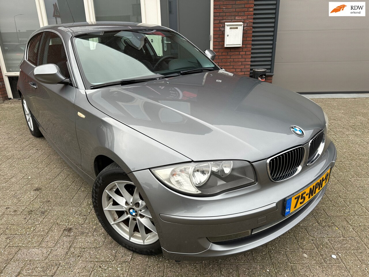 BMW 1-serie - 118i Business Line / Airco / Cruise - AutoWereld.nl