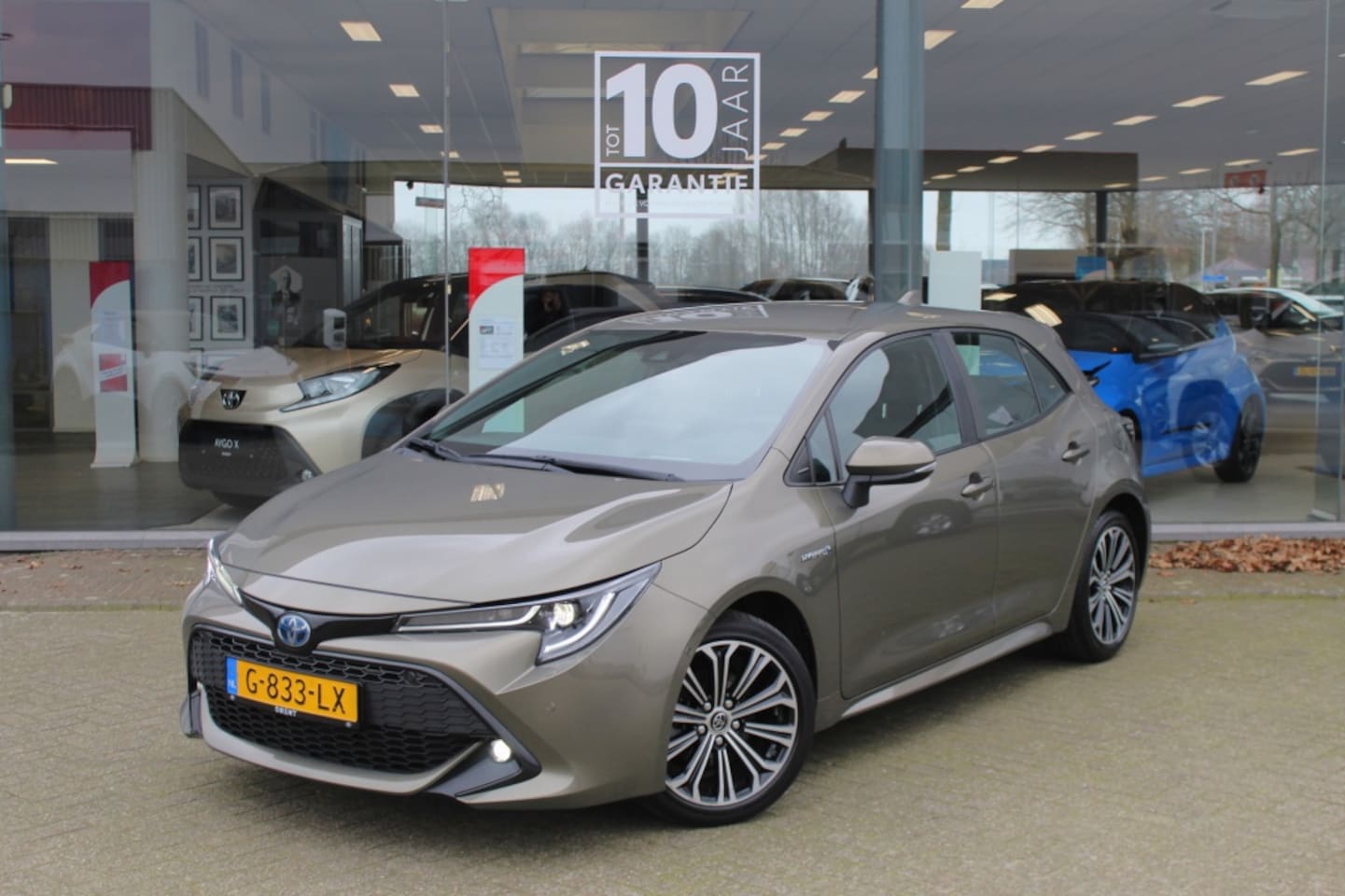 Toyota Corolla - 1.8 Hybrid Bussiness Intro | NL Auto | Head-Up Display | Navi | - AutoWereld.nl