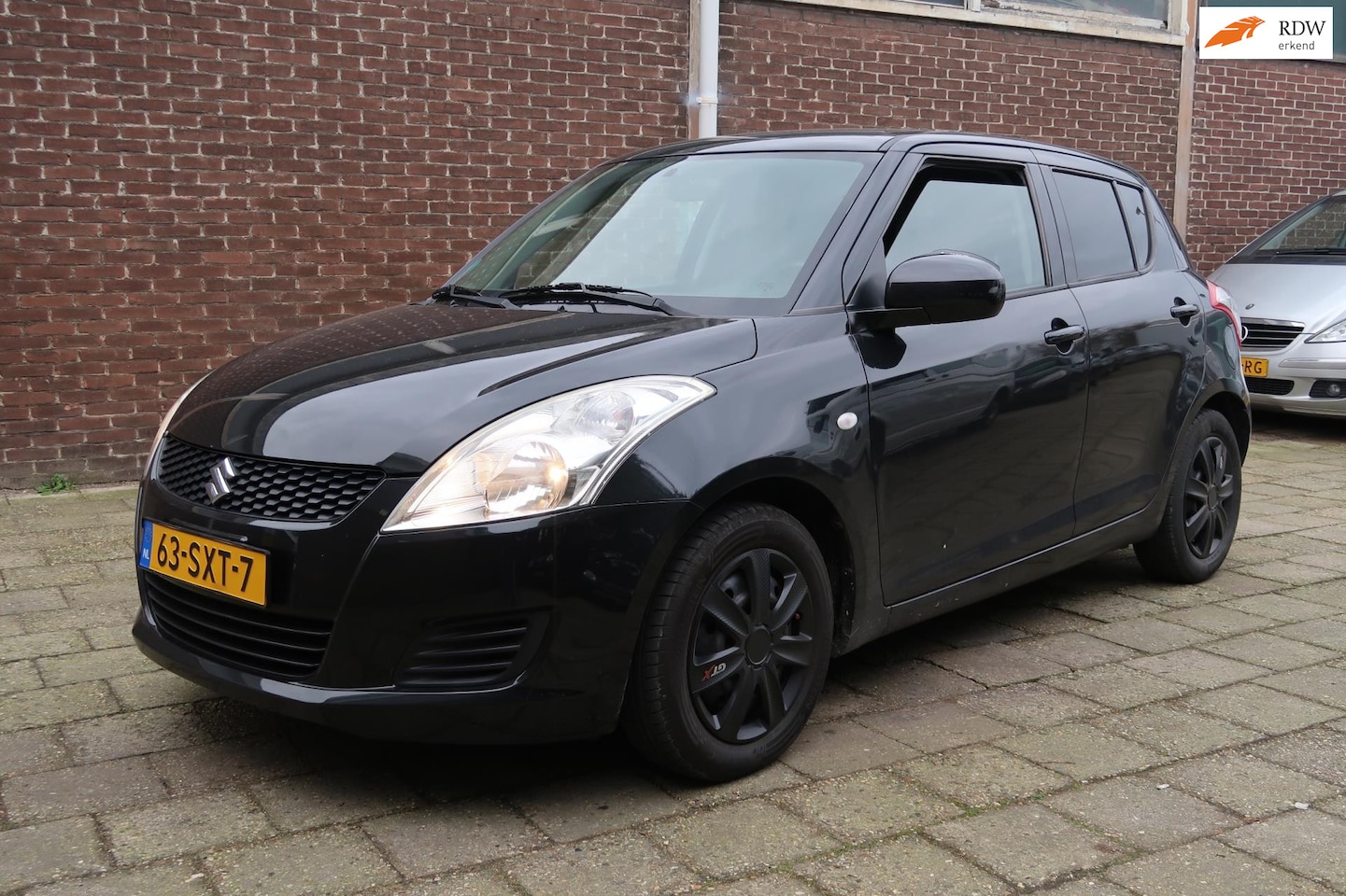 Suzuki Swift - 1.2 Comfort EASSS 1.2 Comfort EASSS, Airco, Stoelverwarming, getinte ramen - AutoWereld.nl