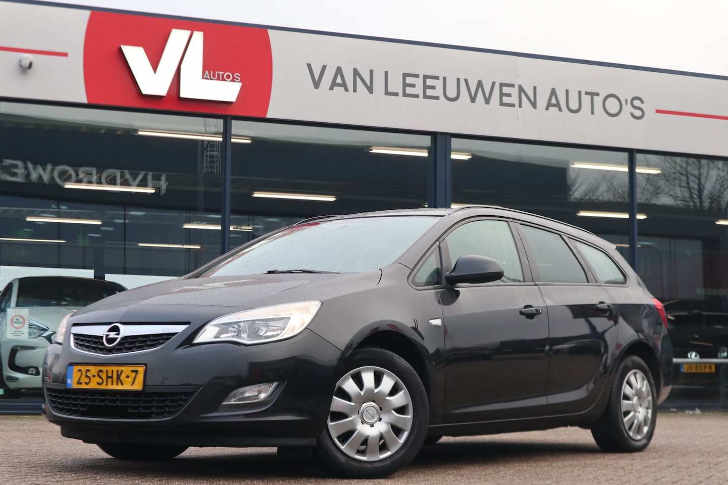 Opel Astra Sports Tourer - 1.4 Edition | Navi | Cruise | Trekhaak - AutoWereld.nl