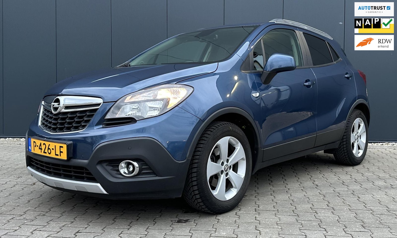 Opel Mokka - 1.6 Cosmo Airco Cruise Trekhaak Stuur en stoelverw. - AutoWereld.nl