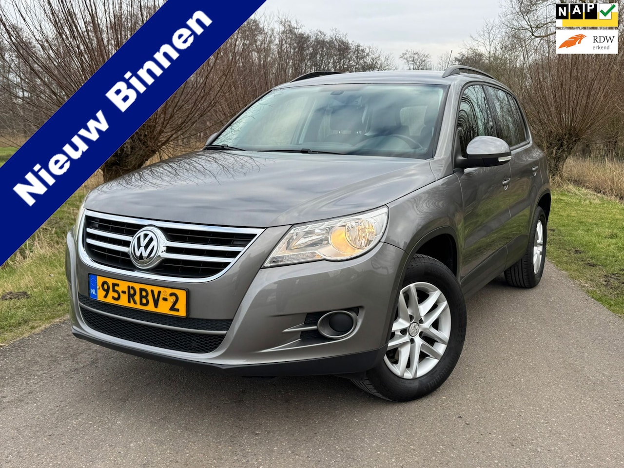 Volkswagen Tiguan - 1.4 TSI Comfort&Design / Keurige Auto / 2 Eigenaren / Airco / Cruise Control / Goed en Rec - AutoWereld.nl