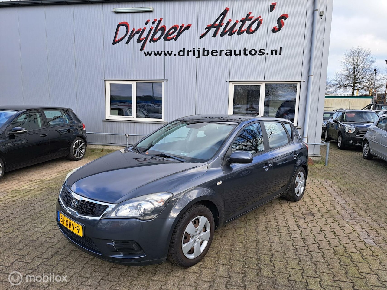 Kia Cee'd Sporty Wagon - 1.4 CVVT X-tra 1.4 CVVT X-tra - AutoWereld.nl