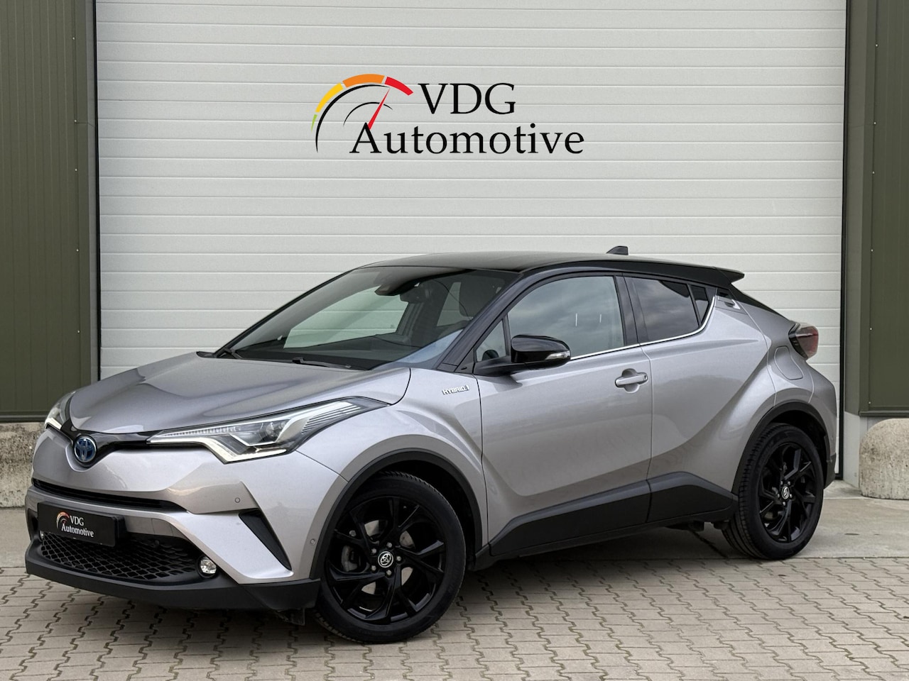 Toyota C-HR - 1.8 Hybrid Dynamic Bi Tone / 18" lm velgen / Parkeer assistent/ Stoel verwarming / Full ma - AutoWereld.nl