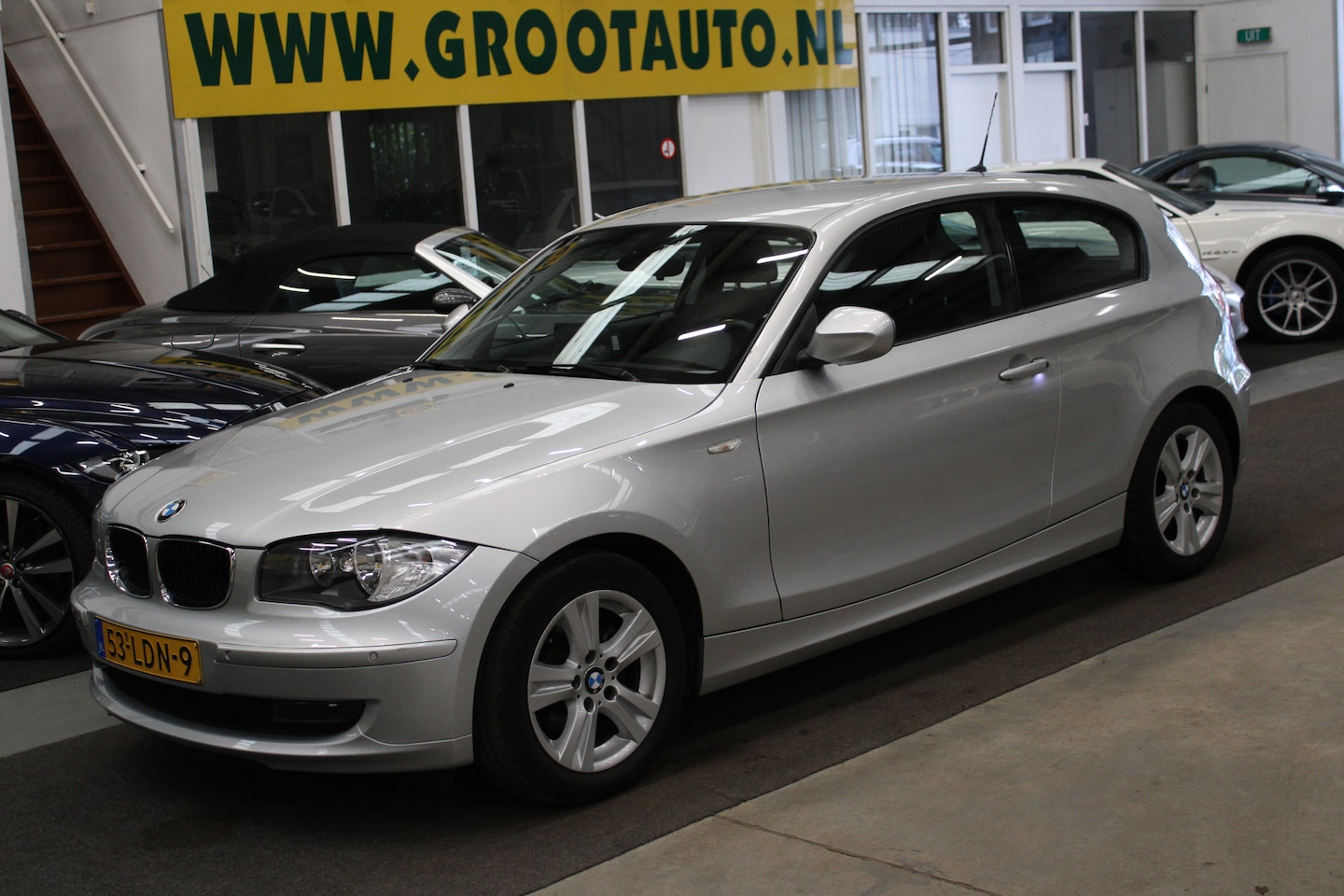 BMW 1-serie - 118i Business Line Style Automaat NAP, Airco, Volledig onderhouden - AutoWereld.nl