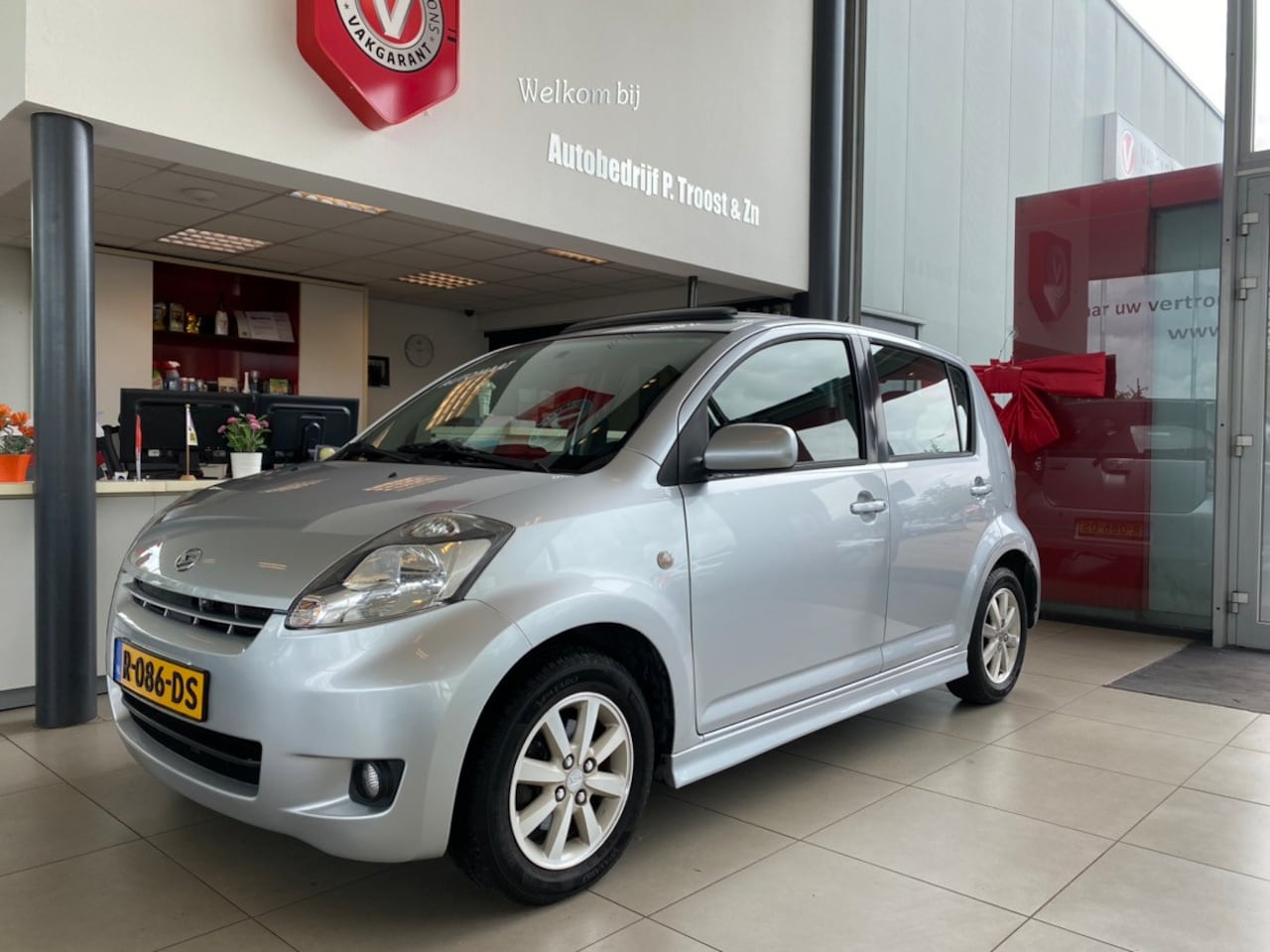 Daihatsu Sirion 2 - 1.3-16V Sport 4X4,Automaat,Schuifkantedak,Airco,Elektrischpakket,Spoilerkit,Achteruitrijse - AutoWereld.nl