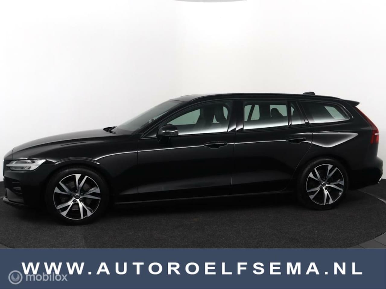 Volvo V60 - 2.0 D4 R-Design| leer/stof| elec stoel| - AutoWereld.nl