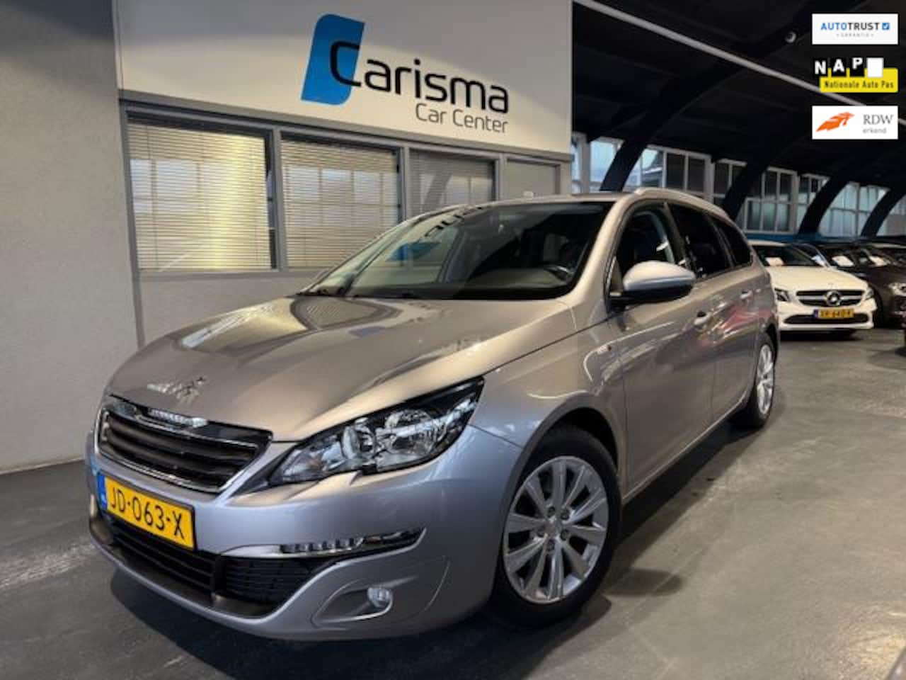 Peugeot 308 SW - 1.2 PureTech Style Navi|Cruise|PDC - AutoWereld.nl