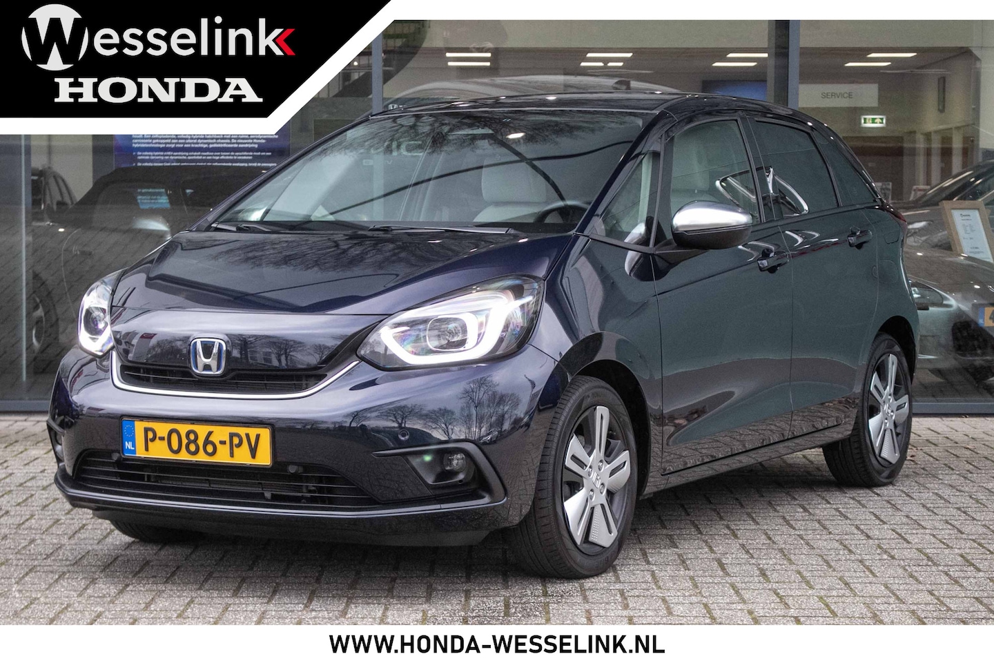 Honda Jazz - 1.5 e:HEV Executive - All in rijklaarprijs | 1e eigenaar | Dealer onderh. | Navi | Apple c - AutoWereld.nl