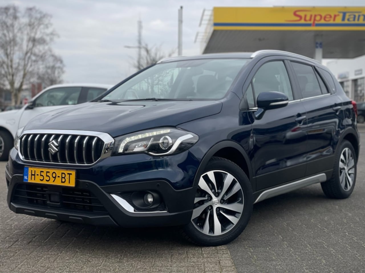 Suzuki S-Cross - 1.4 B.JET STIJL LEER PANO CAMERA NAVI ADD CRUISE PDC V+A - AutoWereld.nl