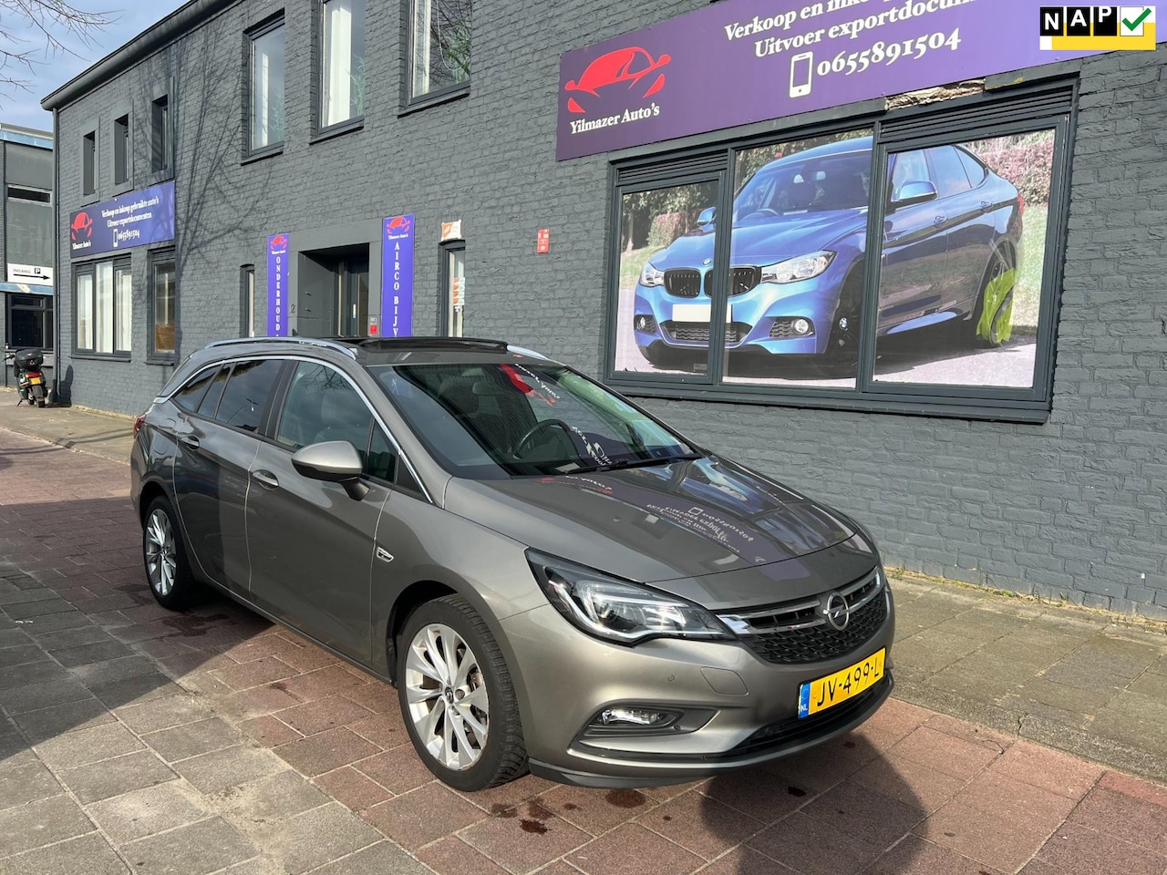 Opel Astra Sports Tourer - 1.0 Edition schuifdak navi nap boekjes - AutoWereld.nl