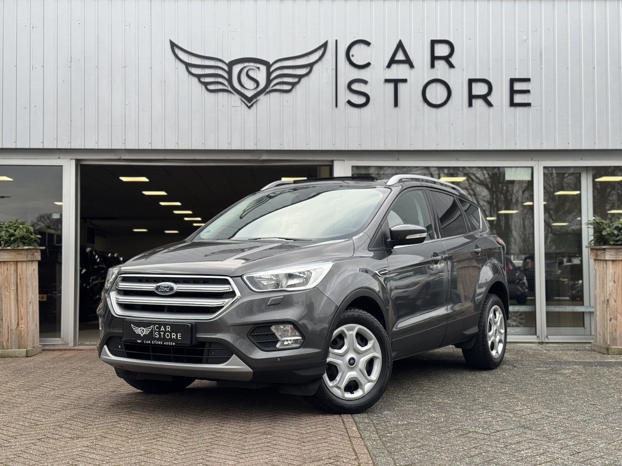 Ford Kuga - 1.5 EcoBoost Trend Ultimate PANO|CRUISE|CLIMA|PDC|STUUR+ST VWM|150PK - AutoWereld.nl