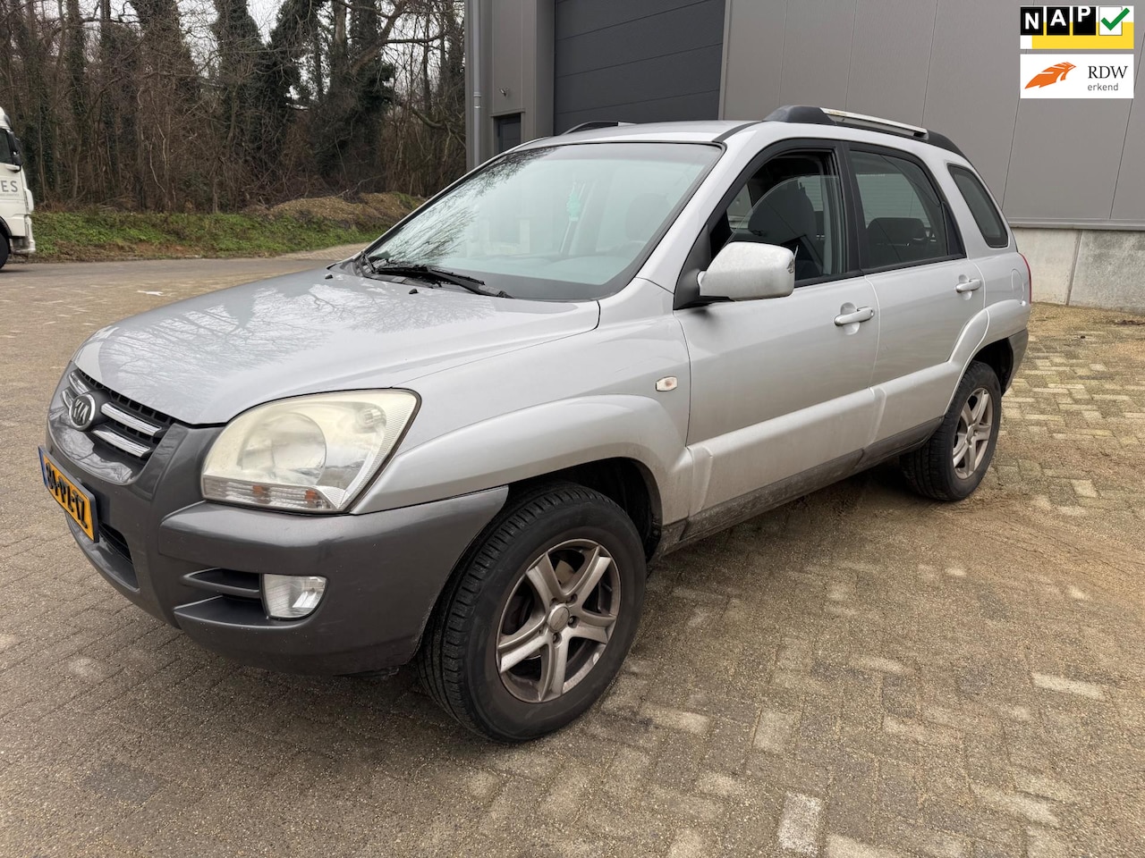 Kia Sportage - 2.0 CVVT Comfort 2.0 CVVT Comfort - AutoWereld.nl