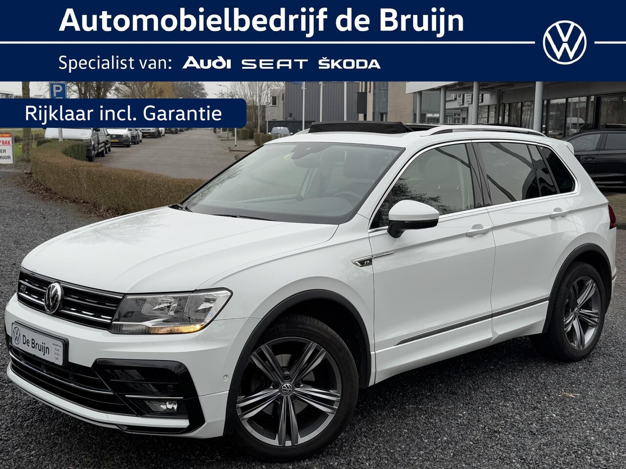 Volkswagen Tiguan - TSI 150pk DSG Highline R-Line (Pano,Trekhaak,Leer,Camera) - AutoWereld.nl