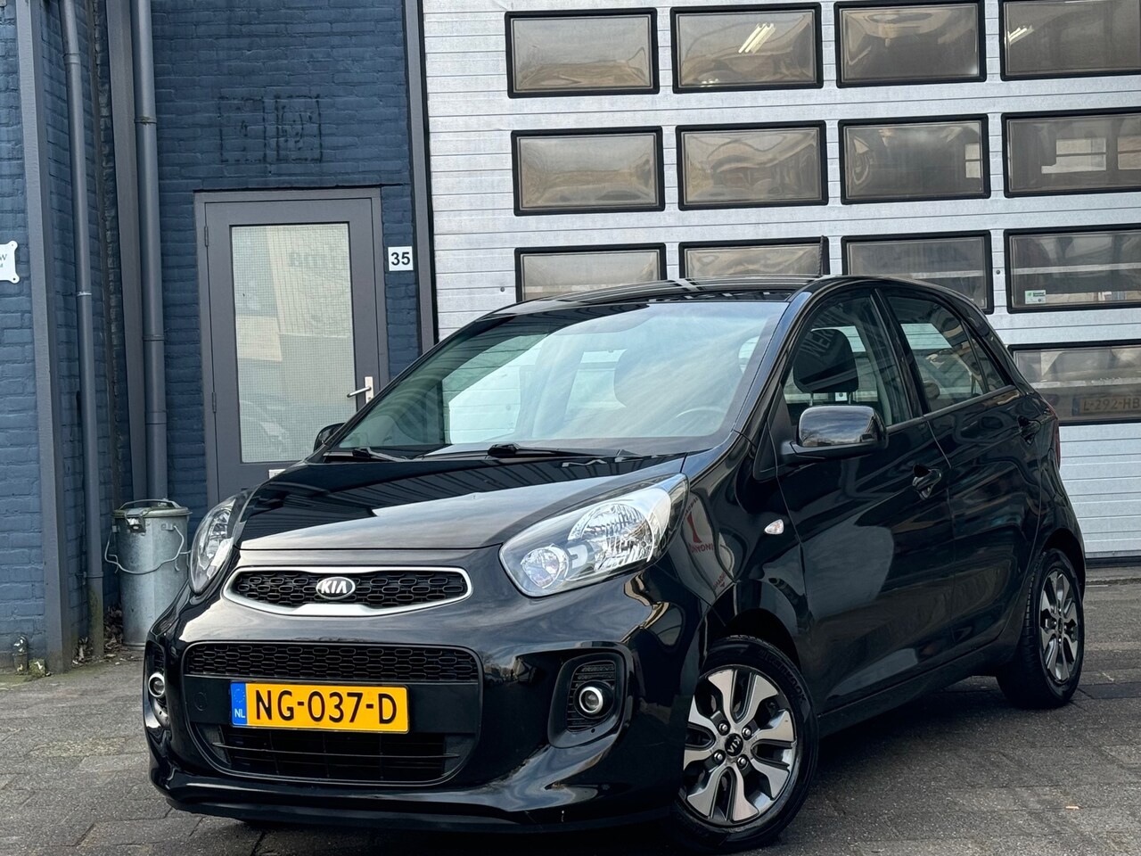 Kia Picanto - 1.0 CVVT EconomyPlusLine | Airco | Navi | Camera | N.A.P - AutoWereld.nl